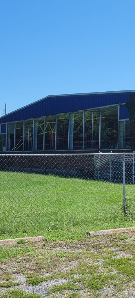 building front with a large window