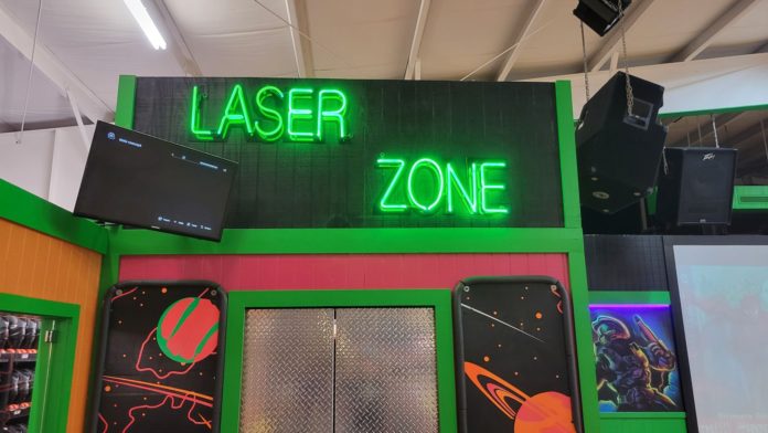 Laser Zone neon sign in Green on a black background