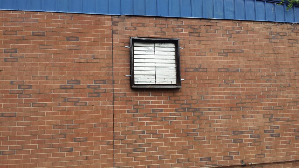 Brick Exterior Building with fan